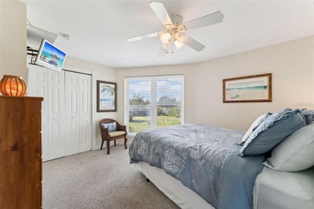 16361 Stringfellow Rd, Bokeelia, FL 33922 - bedroom with carpet floors, a closet, and a ceiling fan