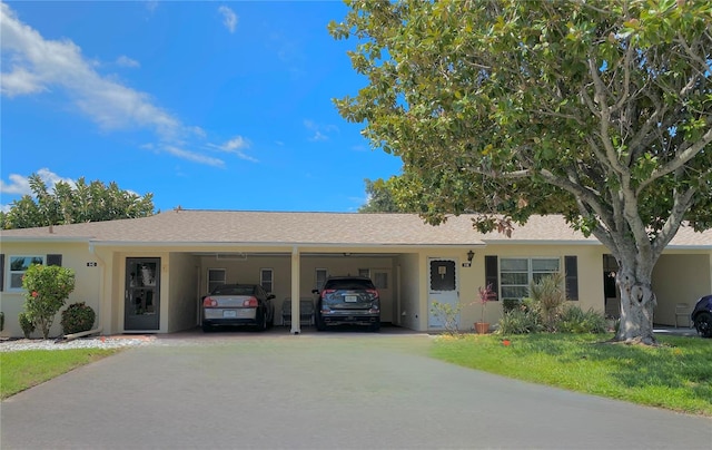 ranch-style home with a carport