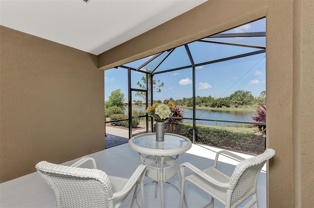 sunroom with a water view