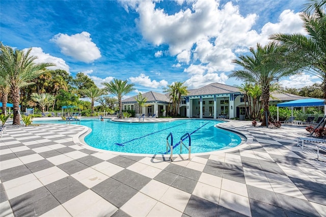 view of swimming pool featuring a patio