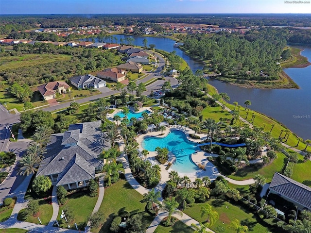 drone / aerial view with a water view