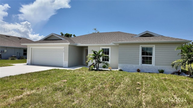 ranch-style home with a front lawn and a garage