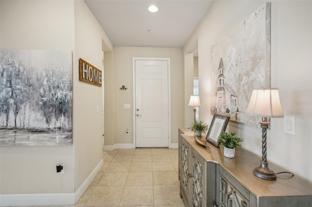 entryway with light tile flooring