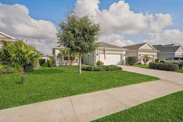 view of front of home featuring a front yard and a garage