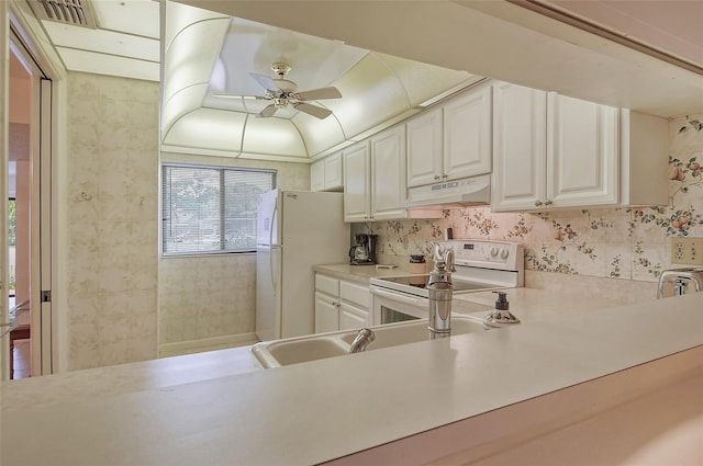 kitchen featuring white cabinetry, sink, ceiling fan, and white appliances