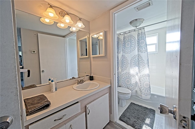 full bath with toilet, visible vents, shower / tub combo with curtain, and vanity