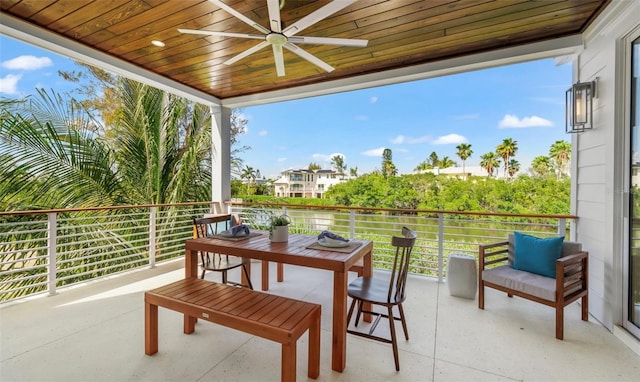 view of patio / terrace featuring ceiling fan and a balcony