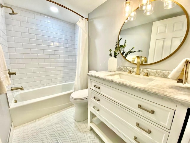 full bathroom with tile floors, shower / bath combination with curtain, toilet, and vanity with extensive cabinet space