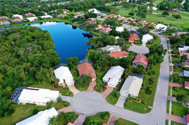 drone / aerial view with a water view