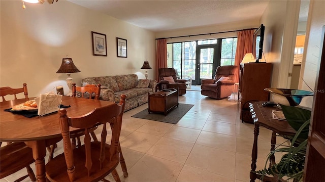 tiled living room with french doors