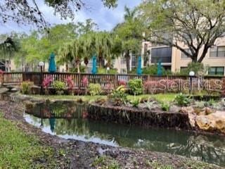 view of property's community featuring a water view