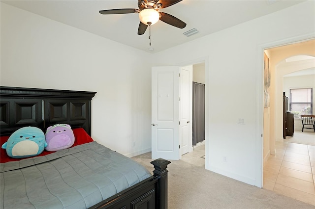 carpeted bedroom featuring ceiling fan