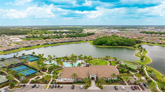 drone / aerial view with a water view