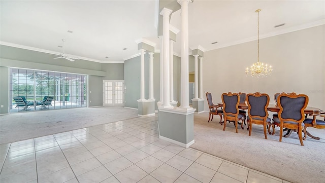 interior space with ornamental molding, light carpet, ceiling fan with notable chandelier, and ornate columns