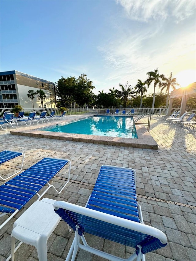 view of swimming pool featuring a patio