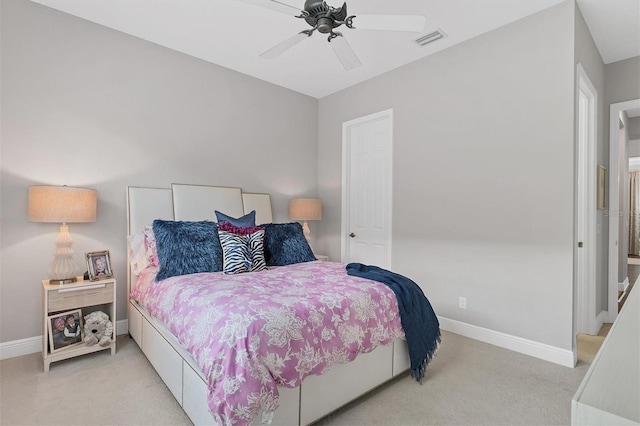 bedroom featuring ceiling fan and light colored carpet