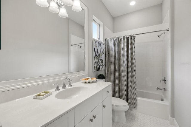 full bathroom with shower / bath combo, vanity, and toilet