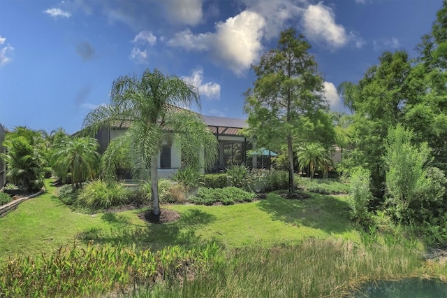 view of yard featuring a lanai