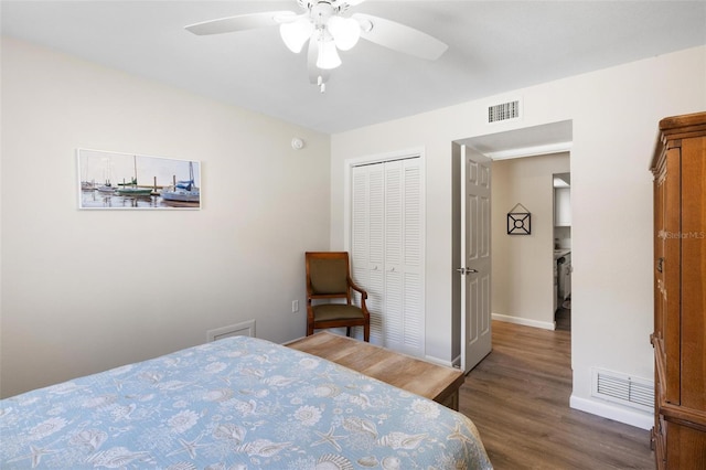 bedroom featuring ceiling fan, a closet, and dark hardwood / wood-style floors