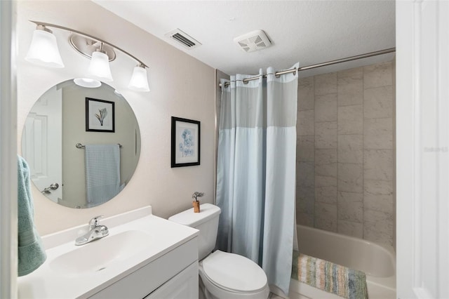 full bathroom with vanity, toilet, and shower / tub combo with curtain