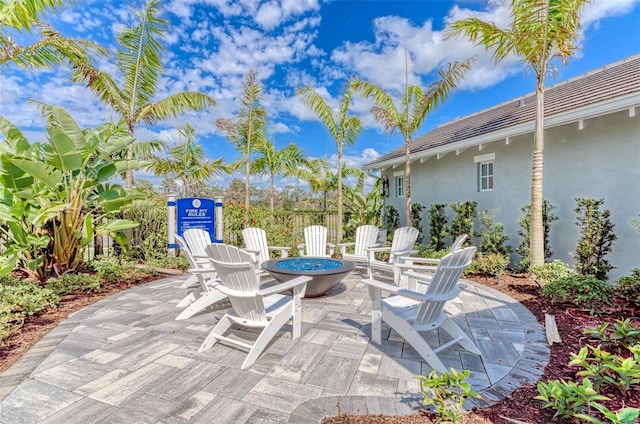 view of patio / terrace featuring a fire pit