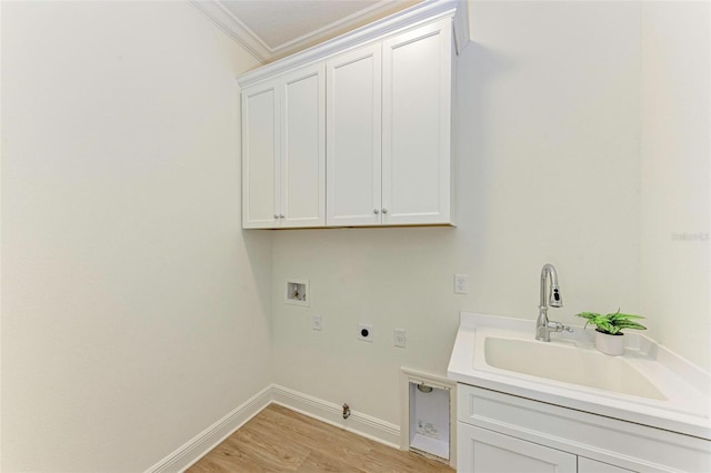 washroom featuring sink, cabinets, hookup for a gas dryer, washer hookup, and electric dryer hookup