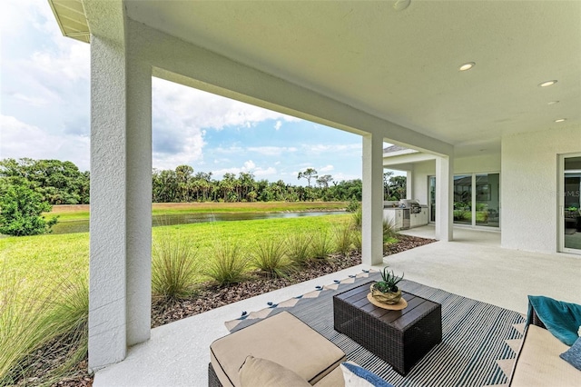 view of patio featuring grilling area and exterior kitchen