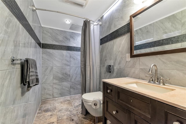 bathroom with tile walls, a shower with curtain, vanity, and toilet