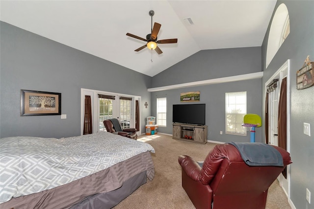 bedroom featuring vaulted ceiling, light colored carpet, french doors, and ceiling fan