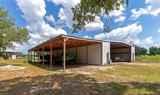 view of outbuilding with a lawn