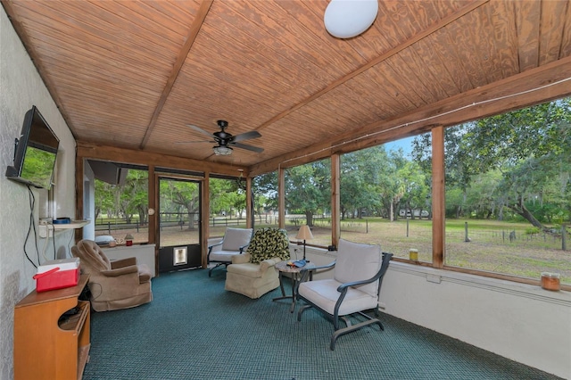 sunroom / solarium with ceiling fan