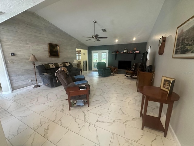 living room featuring lofted ceiling and ceiling fan