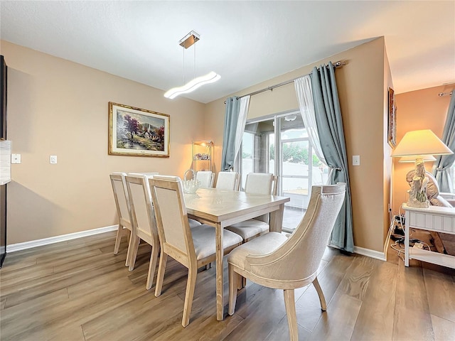 dining room with light wood-type flooring