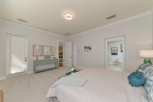 bedroom featuring ornamental molding, light carpet, and connected bathroom