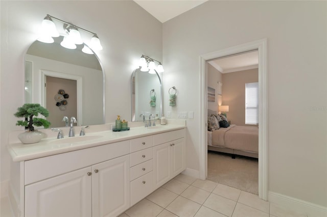 bathroom with tile patterned flooring and vanity