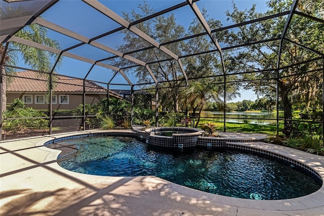 view of pool with an in ground hot tub, a patio, a water view, and a lanai