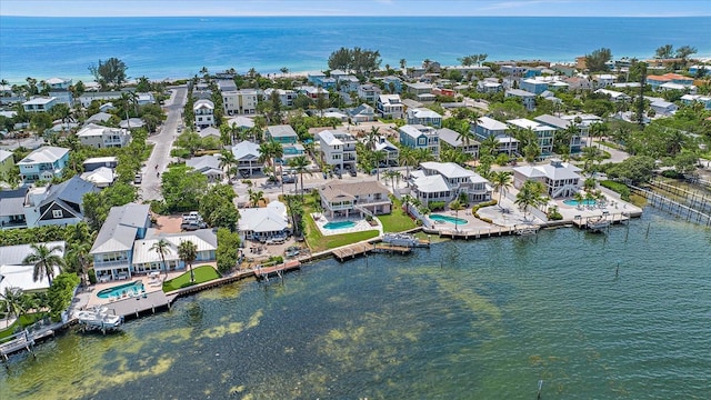 bird's eye view with a water view