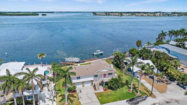 drone / aerial view featuring a water view