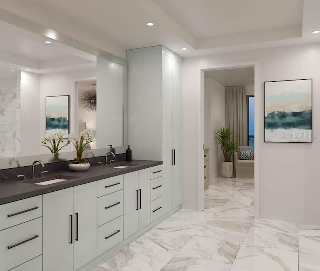 bathroom featuring tile flooring, a raised ceiling, and double sink vanity