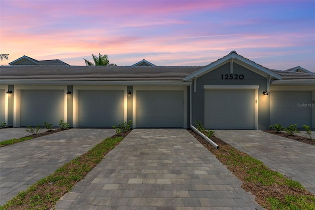 single story home featuring a garage