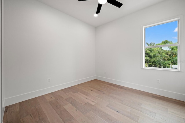 unfurnished room featuring ceiling fan and light hardwood / wood-style flooring