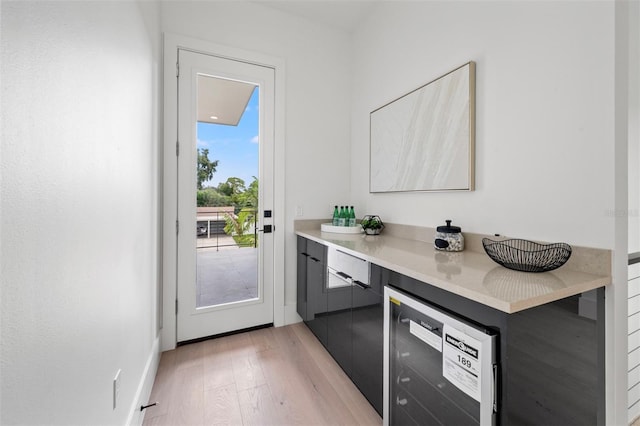 interior space featuring light hardwood / wood-style flooring and beverage cooler