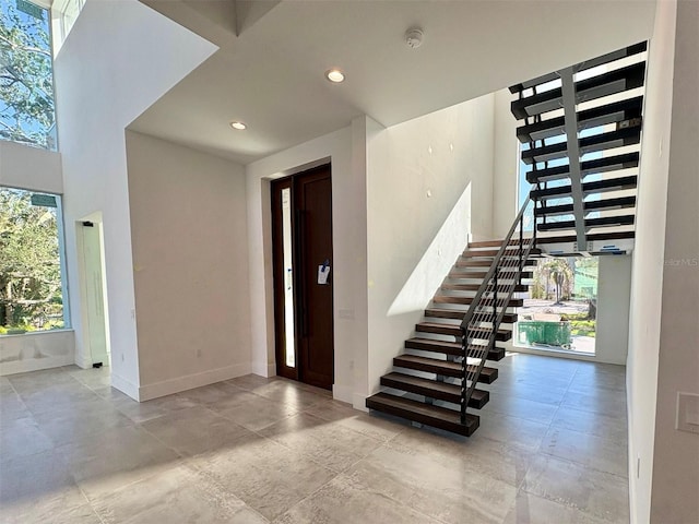 entryway featuring a high ceiling