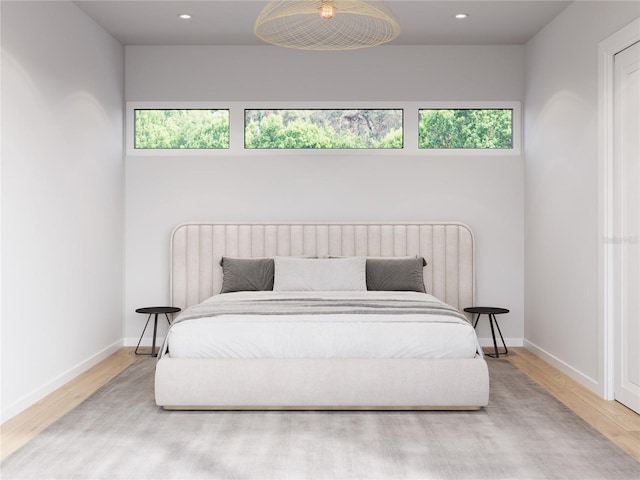 bedroom featuring wood-type flooring