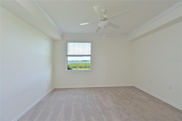 1020 Tidewater Shores Loop Unit 108, Bradenton, FL 34208 - unfurnished room with light carpet, crown molding, and a ceiling fan