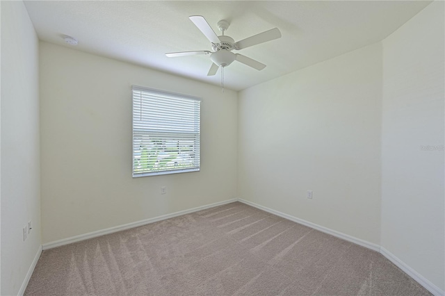 1020 Tidewater Shores Loop Unit 108, Bradenton, FL 34208 - spare room featuring light carpet and a ceiling fan
