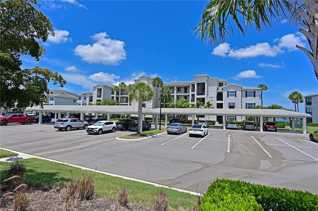 1020 Tidewater Shores Loop Unit 108, Bradenton, FL 34208 - view of partially covered parking lot