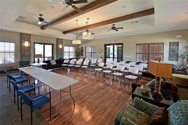 1020 Tidewater Shores Loop Unit 108, Bradenton, FL 34208 - dining area featuring ceiling fan, wood finished floors, healthy amount of natural light, beam ceiling, and recessed lighting