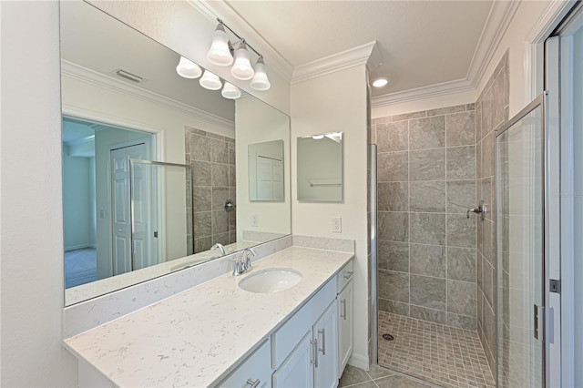 1020 Tidewater Shores Loop Unit 108, Bradenton, FL 34208 - full bathroom with vanity, ornamental molding, and a tile shower
