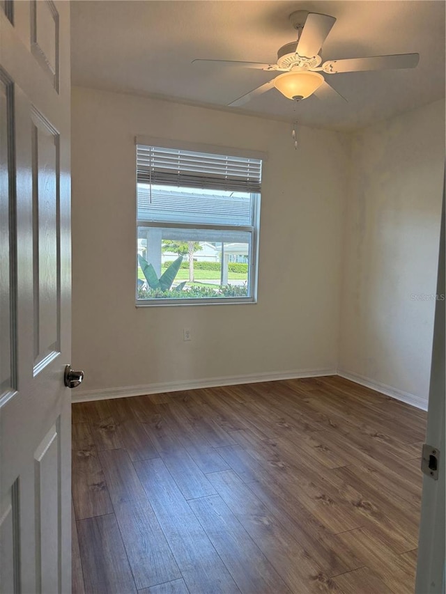1020 Tidewater Shores Loop Unit 108, Bradenton, FL 34208 - unfurnished room with hardwood / wood-style flooring and ceiling fan